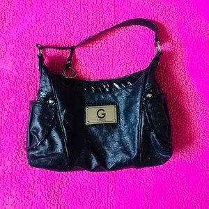 Guess black purse.